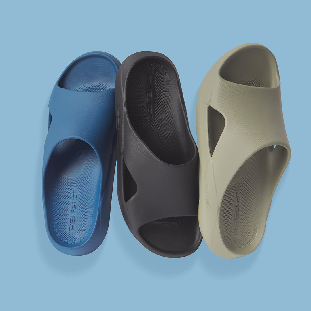 3 men's recovery slides in blue, black and pavement.