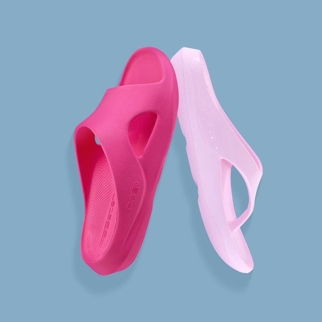 An image of PB5star's recovery slide in pink next to a recovery flip flop in powder pink