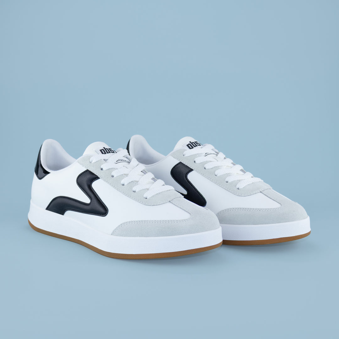 Pair of PB5STAR Cosmic sneakers in white, black, and grey with gum soles, shown in isometric view on light blue background.