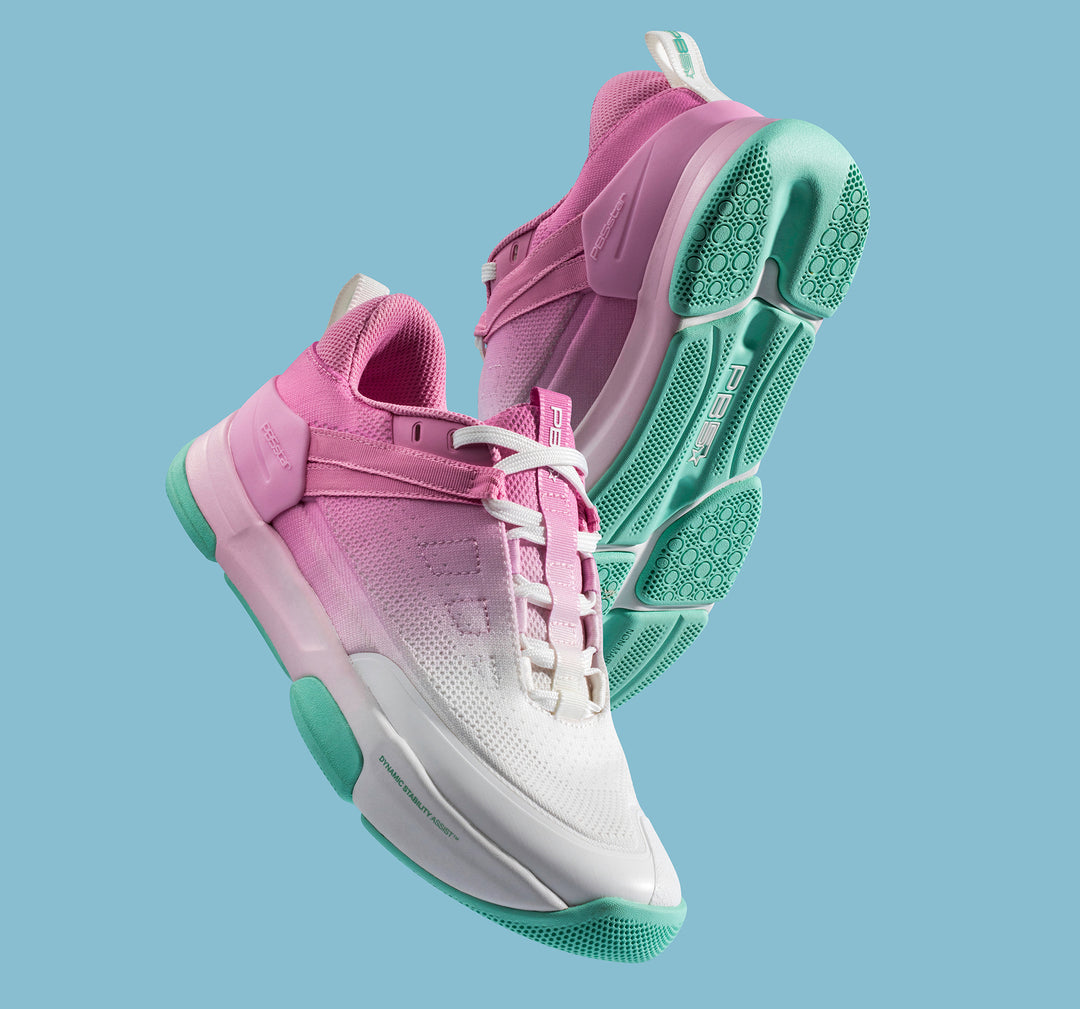 Women's pink multi with mint soles PB5 Court2 pickleball shoe floating on blue background