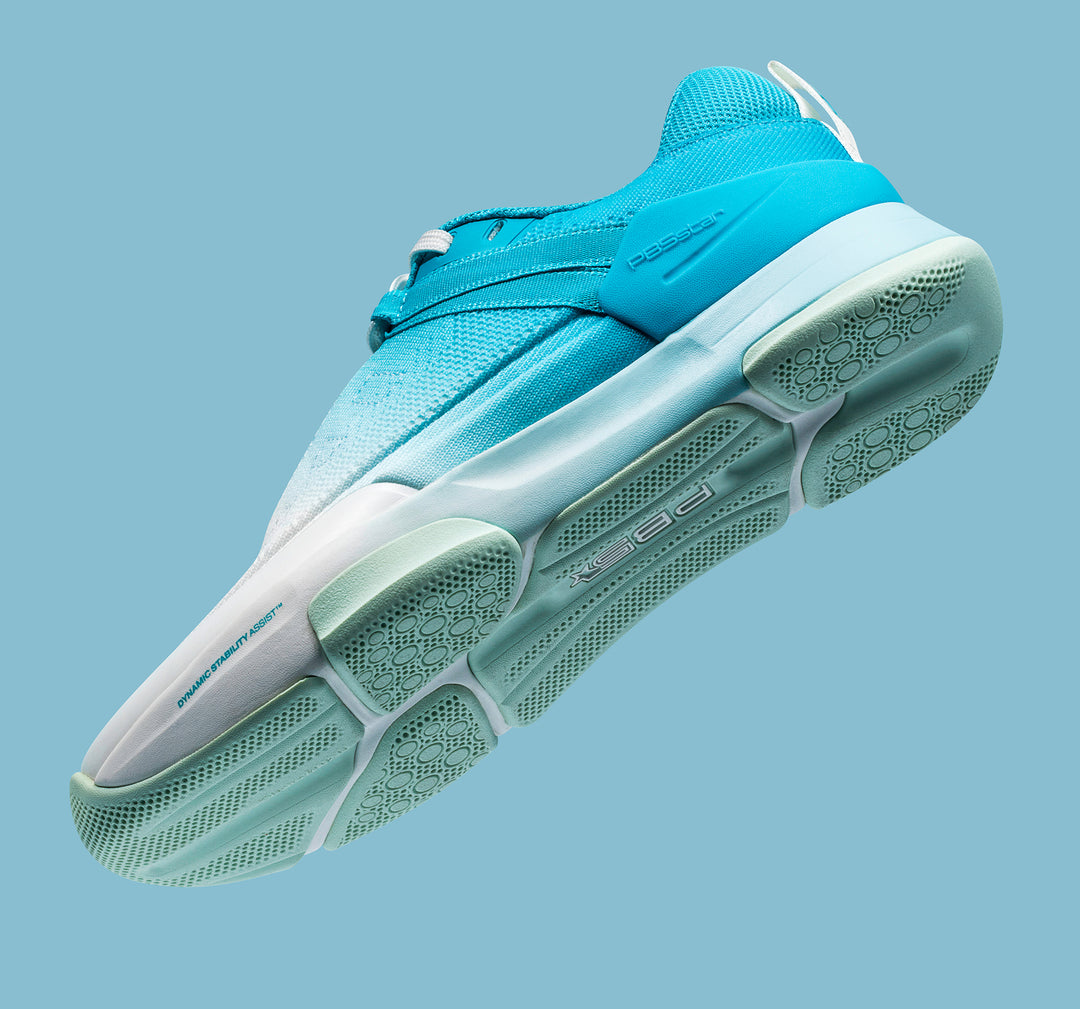 Women's blue multi PB5 Court2 pickleball shoe floating on blue background