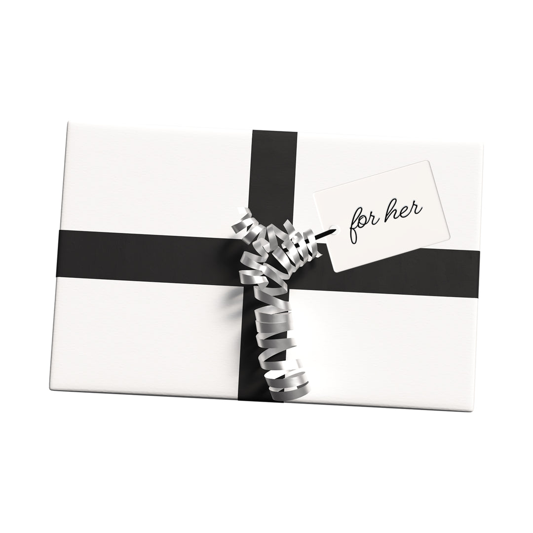White gift box wrapped with a black ribbon and silver curly bow, featuring a tag that says "for her," perfect for thoughtful gift ideas for women.