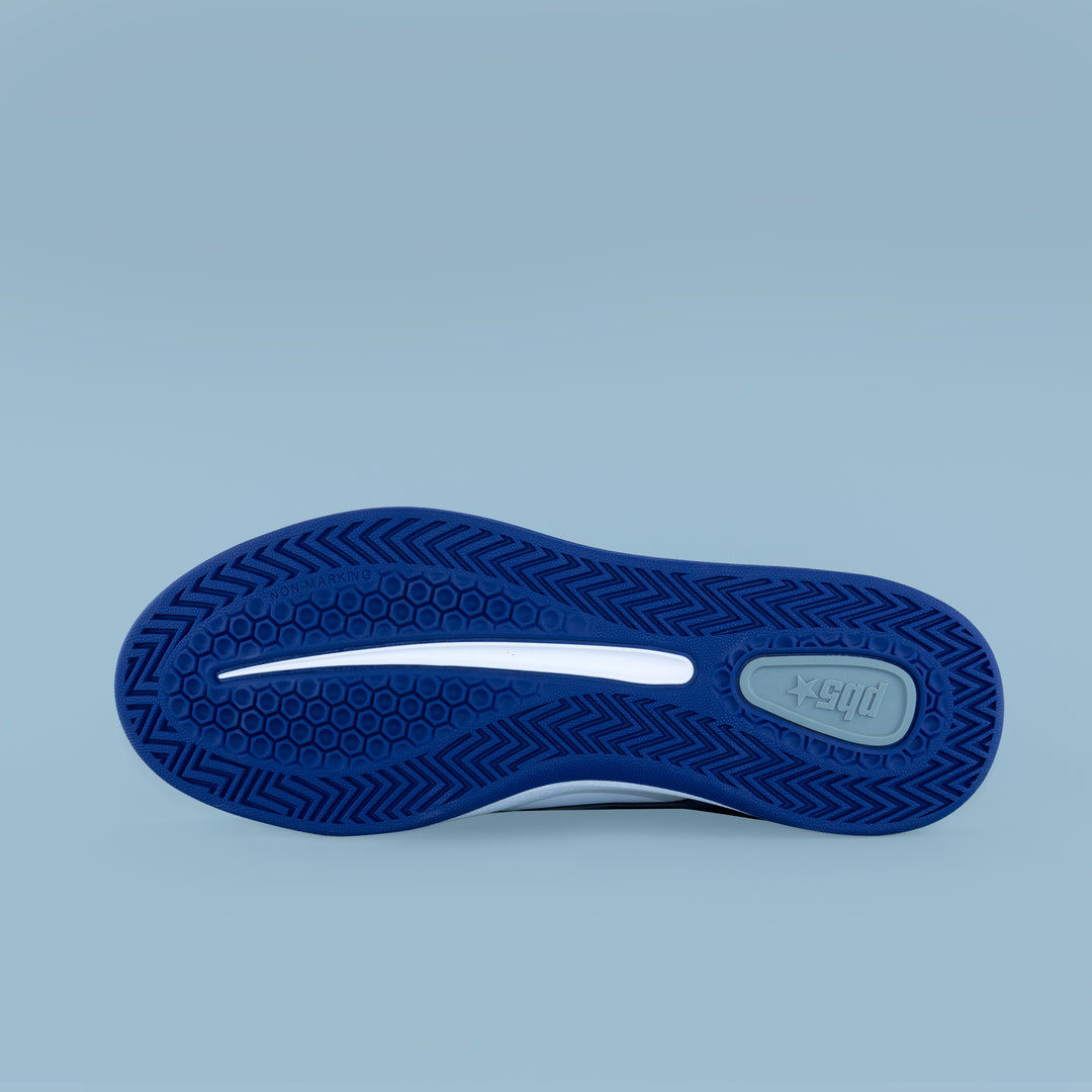Bottom view of PB5star men’s Cosmic sneaker with blue rubber outsole featuring hex and herringbone traction.