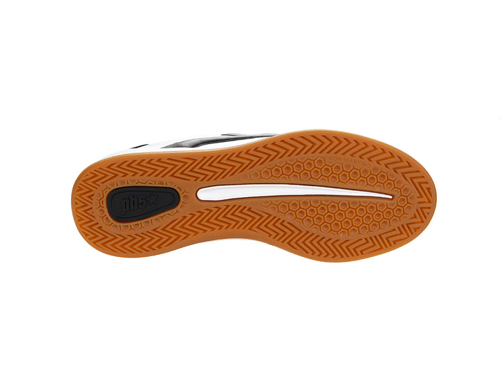 Bottom sole view of a white and black low-top sneaker with gum outsole