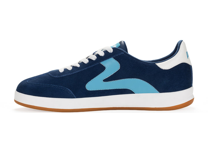 Medial side view of a navy and sky low-top sneaker with gum sole