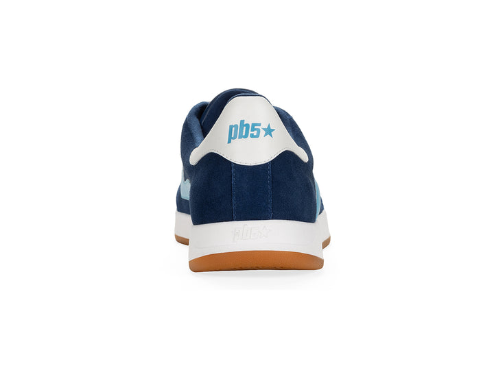 Rear view of a navy and sky low-top sneaker with gum sole