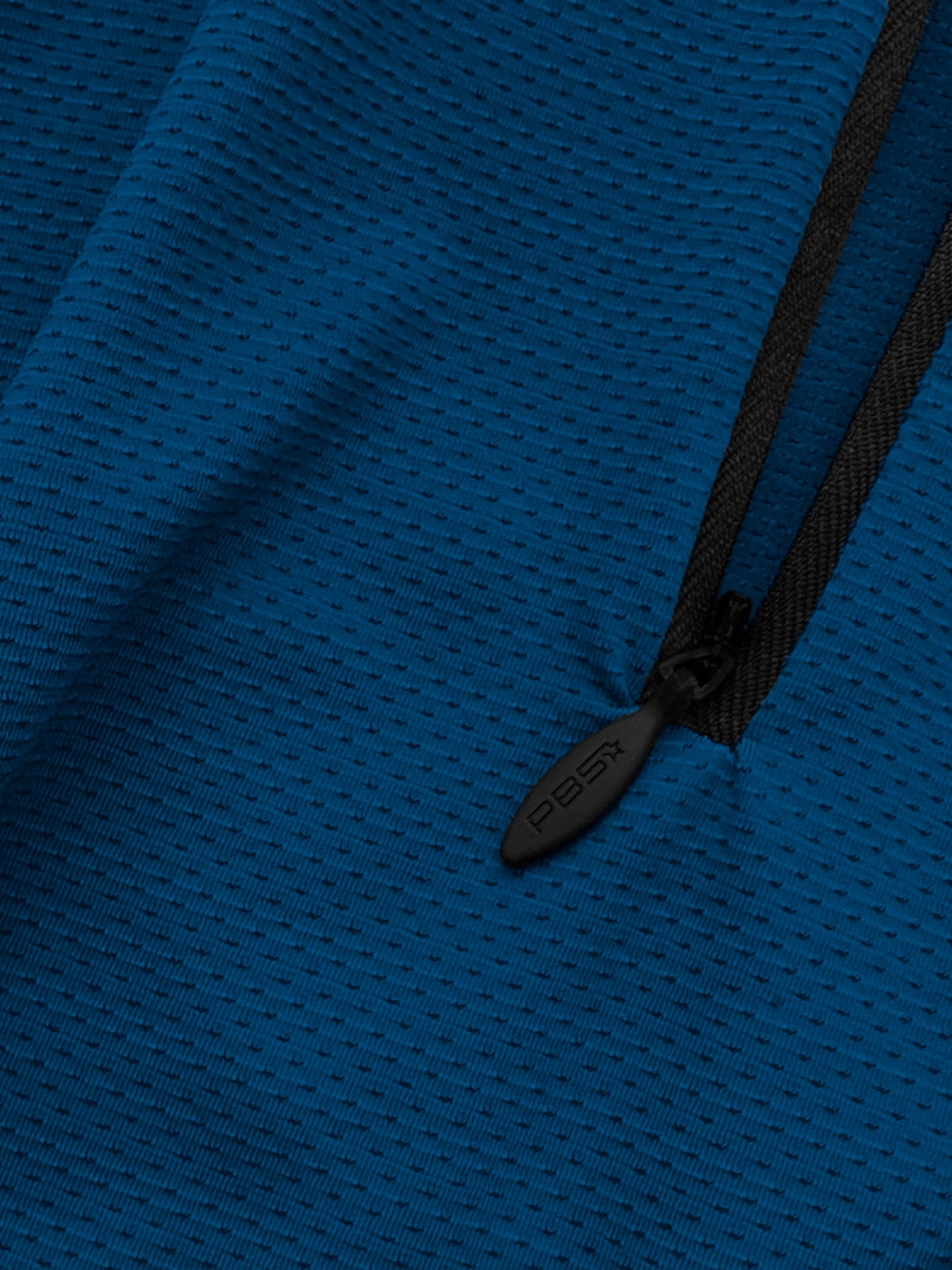 Close-up of fabric detail on the astral blue M's Long Sleeve Layering Tee with zipper pull.