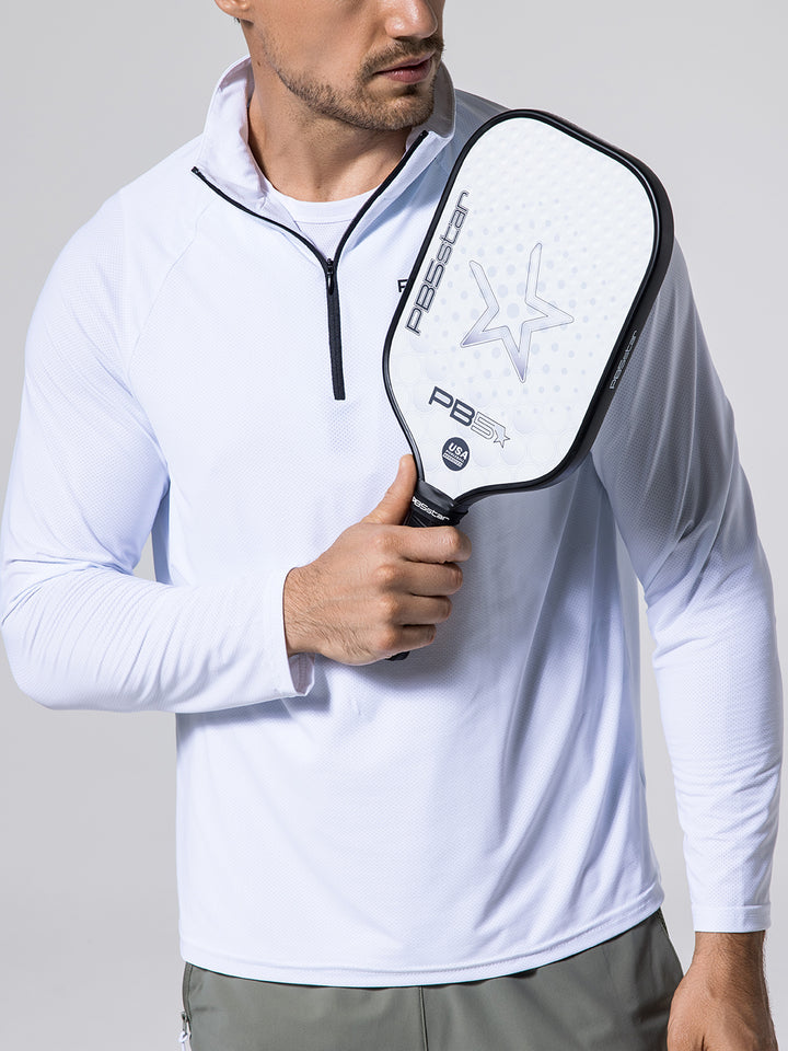 Man wearing white M's Layering Tee and holding a PB5star Balance Pickleball Paddle against a light gray background.