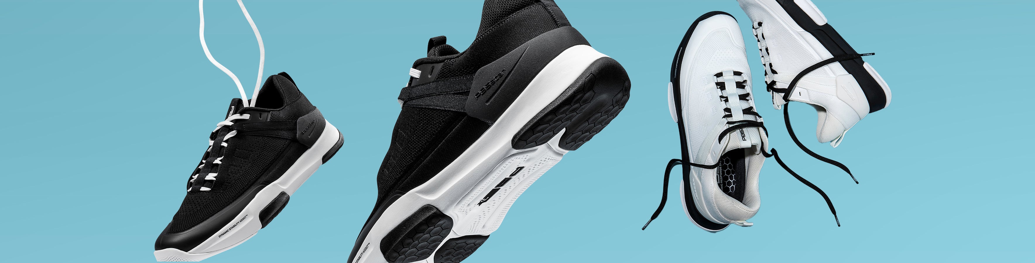 Men's pickleball shoes in black and white designed for court performance, featuring lightweight construction and grip soles