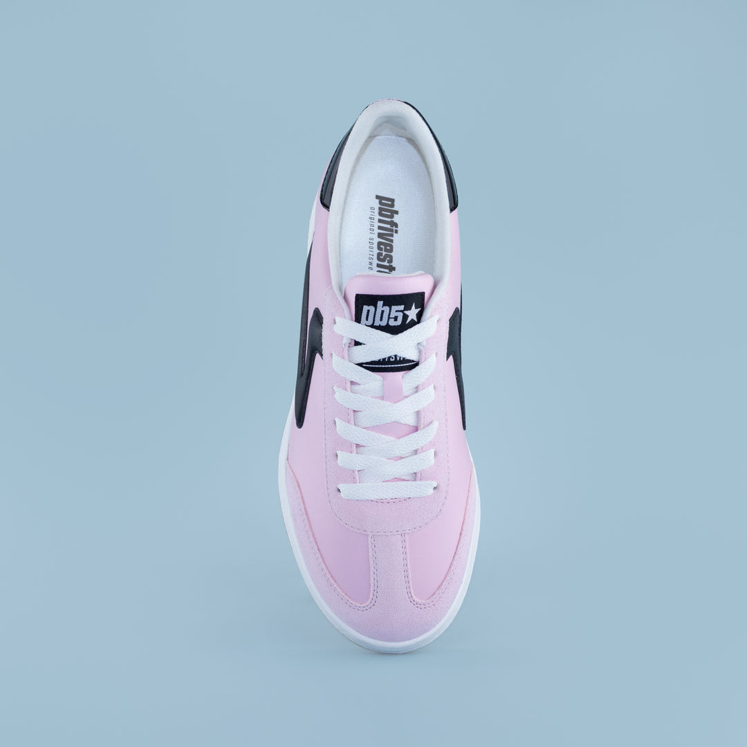 Top view of women’s Cosmic sneaker in pink and black with white laces, designed for pickleball players and court apparel style.