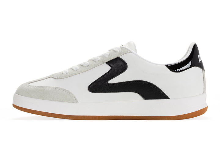 Medial side view of a white and black low-top sneaker with gum sole and metallic gold heel tab