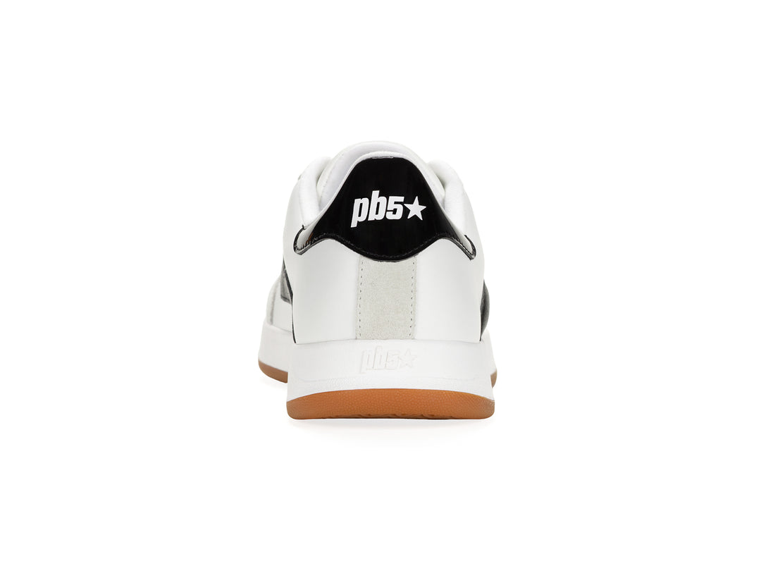 Rear view of a white and black low-top sneaker with gum sole