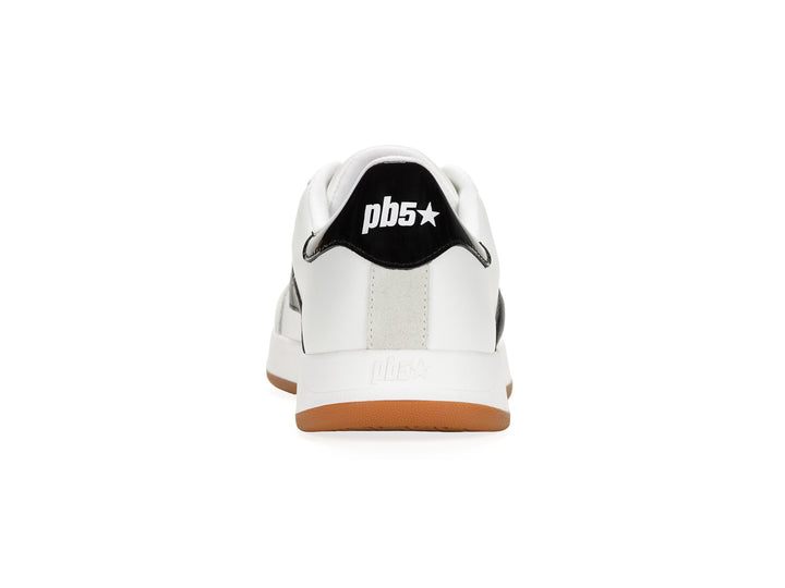 Rear view of a white and black low-top sneaker with gum sole