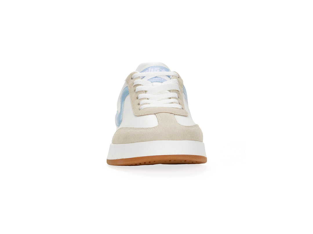 Front view of a white and light blue low-top sneaker with gum sole