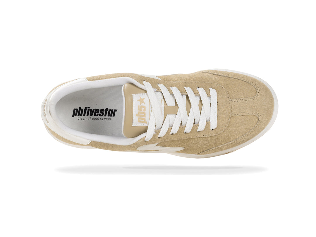 Top view of a sand and white low-top sneaker with white laces