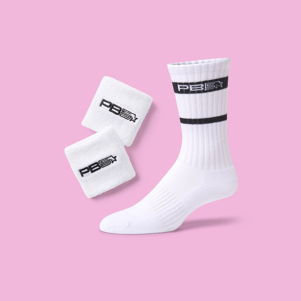 PB5star white athletic crew sock and sweat wristbands with black logo branding on pink background, pickleball performance accessories