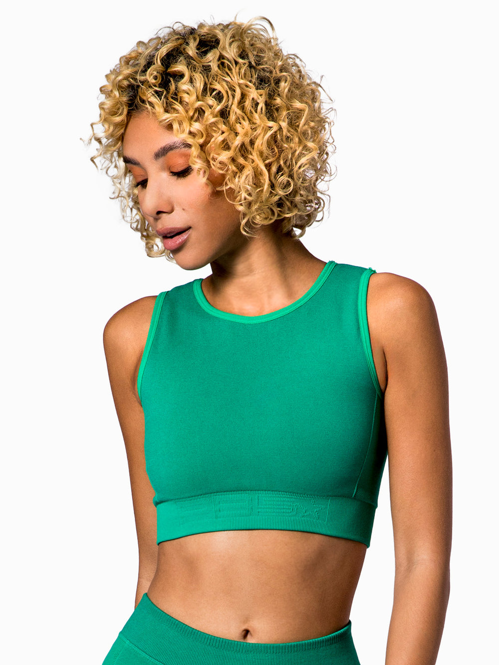 Model wearing PB5star's jade Compression Knit Sports Bra with a sleek, supportive design.