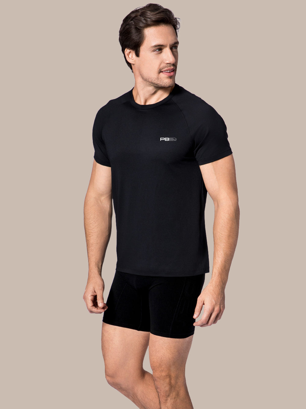 Model in men's black Compression Shorts, ideal for pickleball agility and comfort.