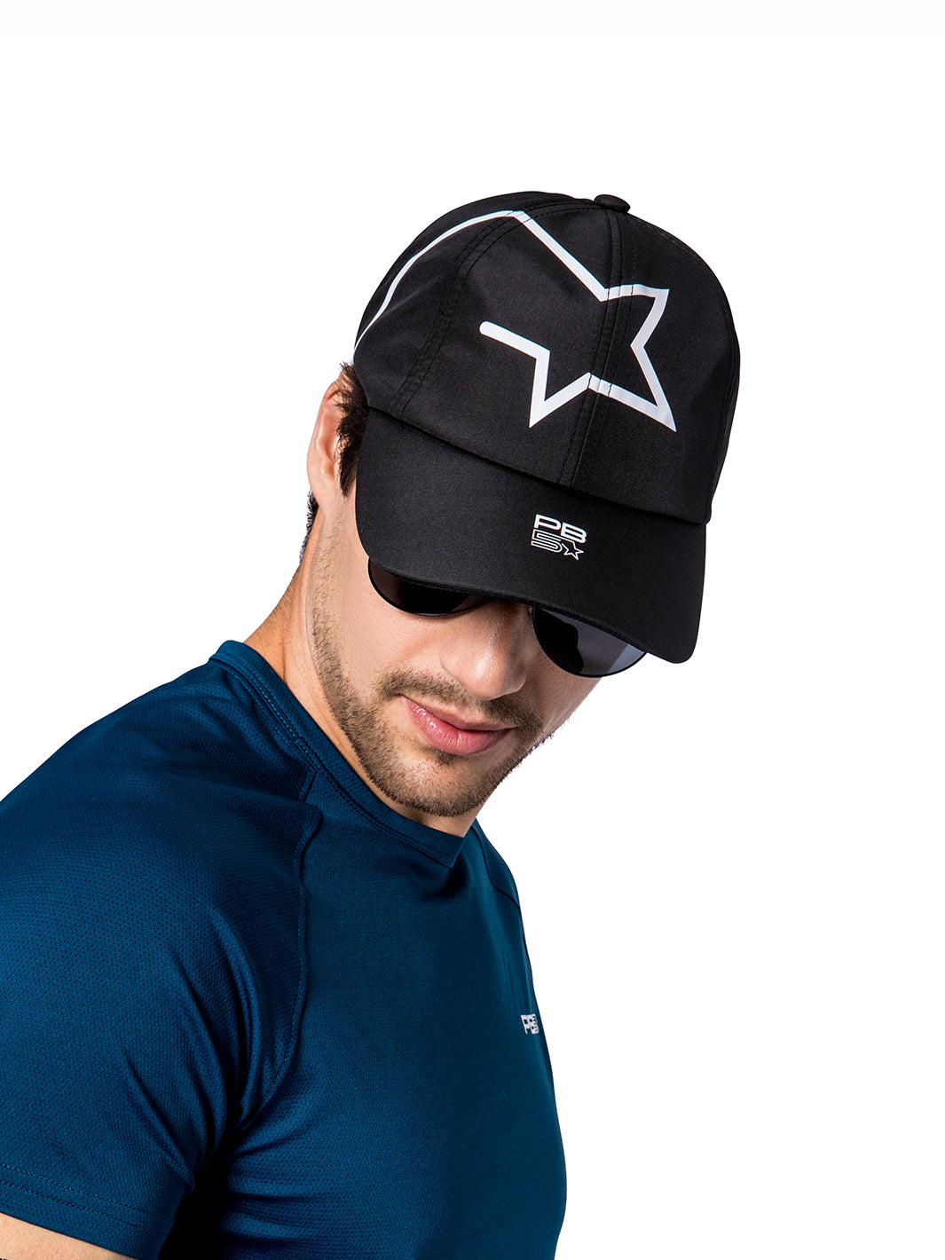 Athlete wearing PB5star's Stellar Cap in black with distinctive white star logo, a trendy accessory for both sports and casual wear.