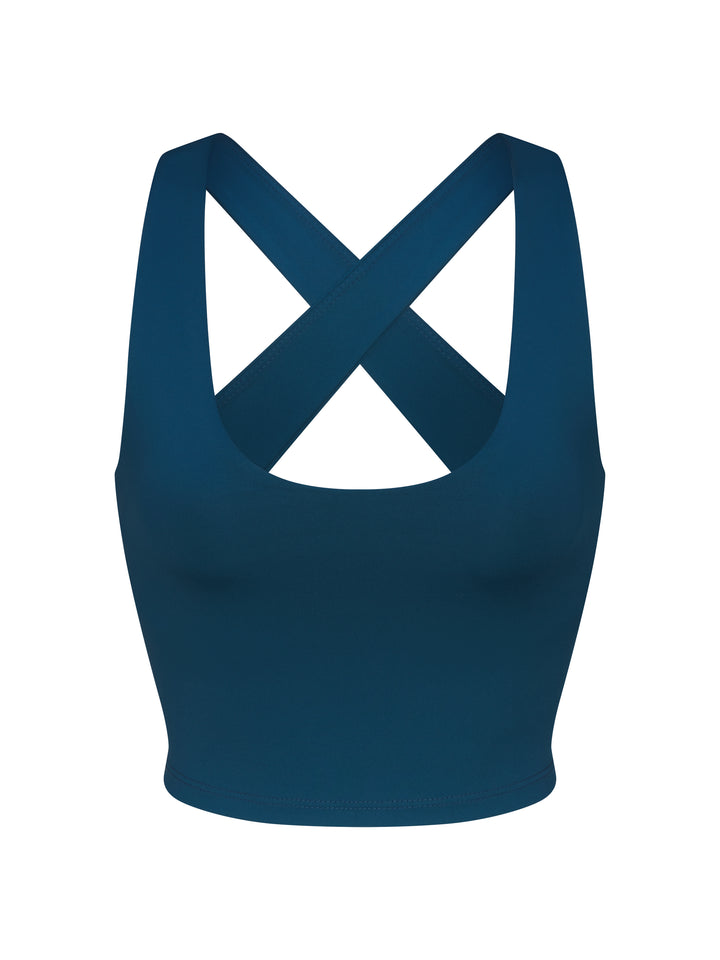 Front view of PB5star women's astral blue sports bra with cross-back strap design