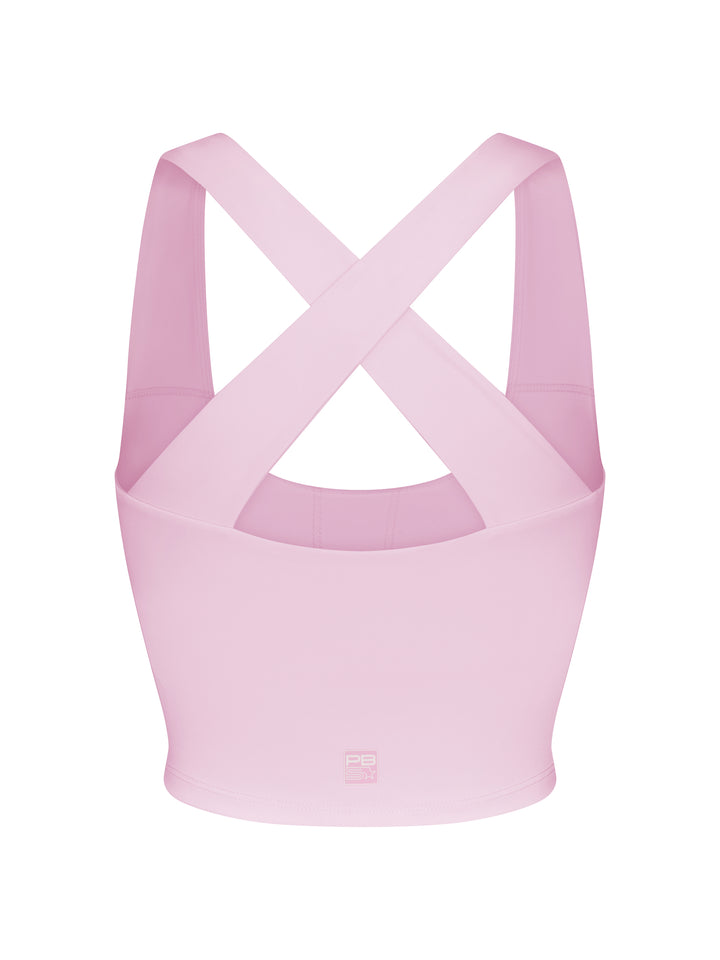 Back view of PB5star women's powder pink scoop neck sports bra with cross-back straps