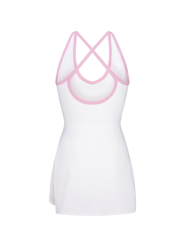 The back view of the side-split court dress in white with powder pink trim.
