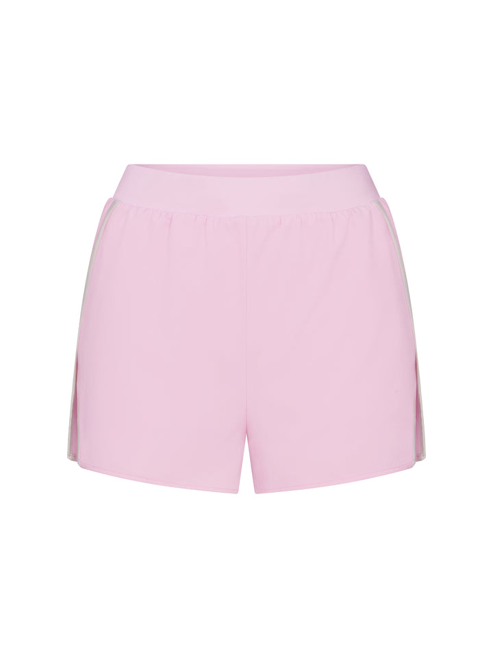 Front view of PB5star women's powder pink athletic shorts with subtle side split design